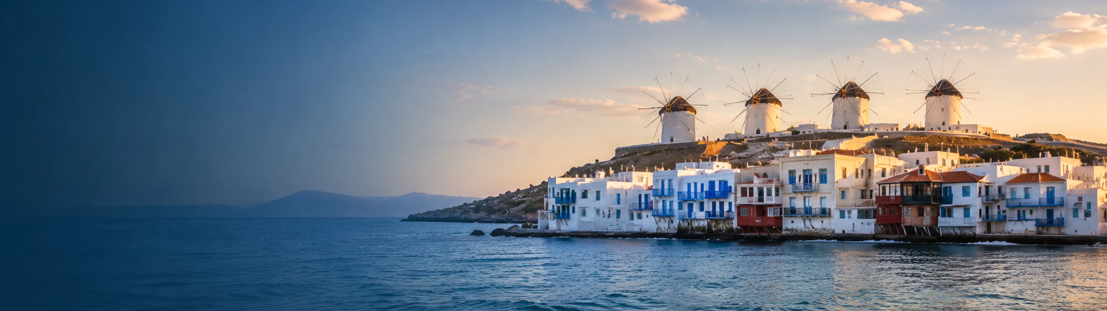 Molinos de Kato Mili y Little Venice vistos desde el mar en Mykonos