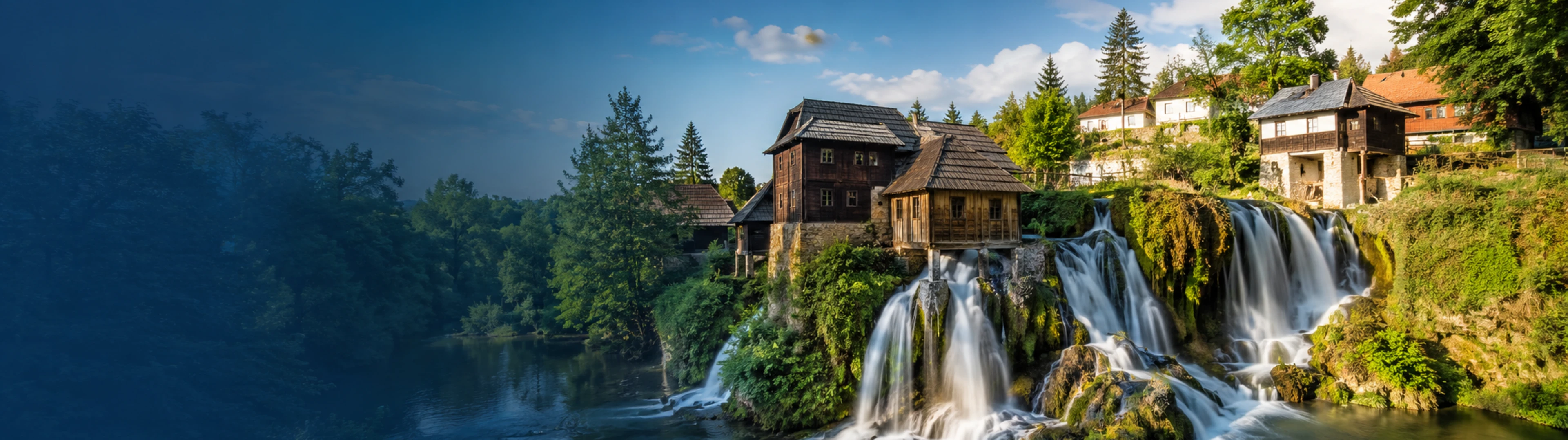 Cascadas y vegetación de Rastoke vistas desde el exterior